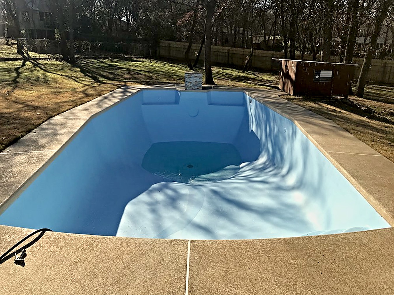 Finished re-coat, medium blue, wooded North Texas lot